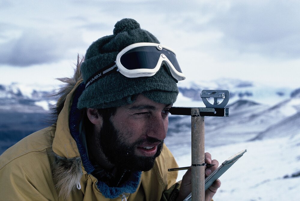Barry Kohn measuring a stratigraphic section with Jacob&rsquo;s staff