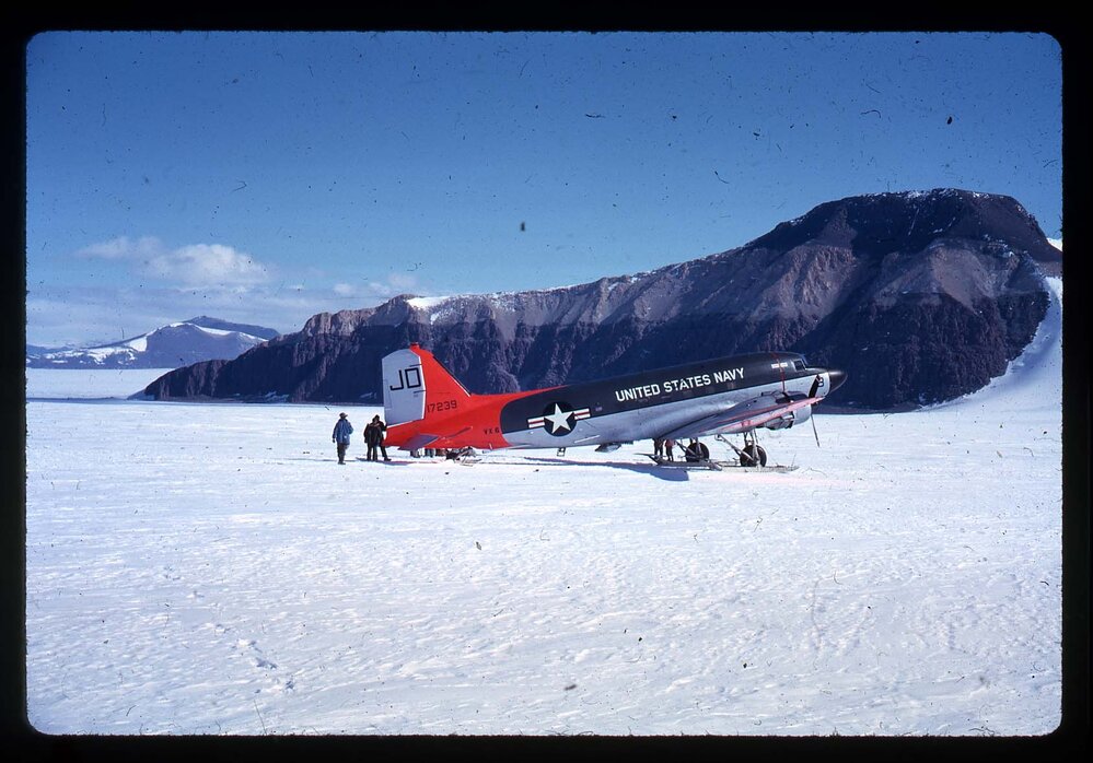 [Unnamed slide] depicts stationary United States Navy Otter plane