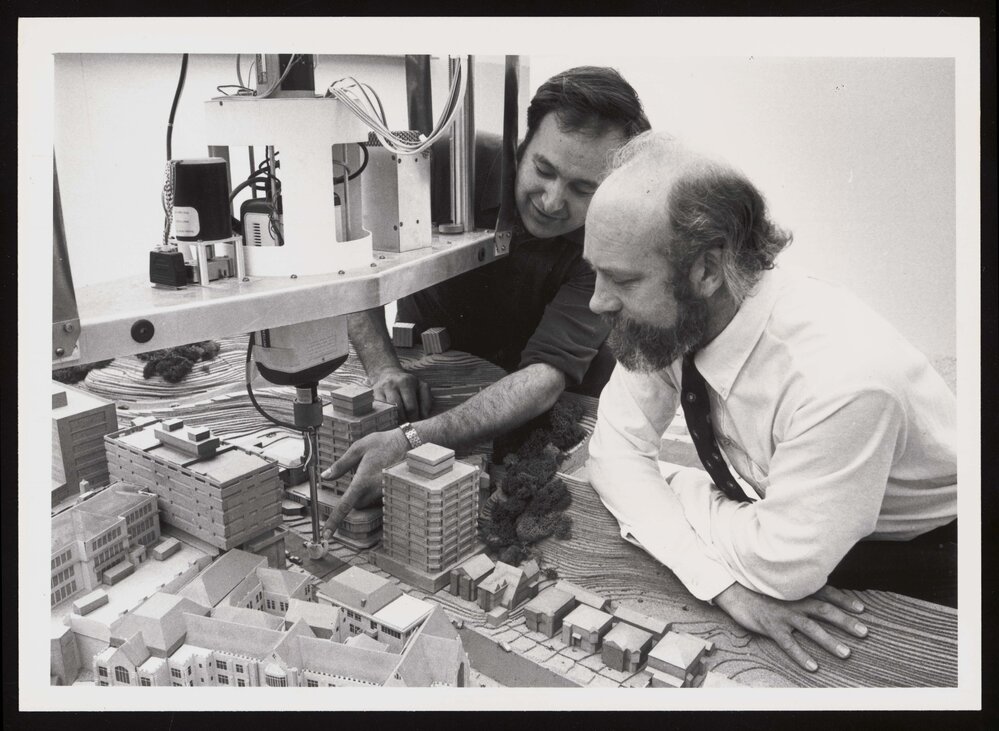 Architecture senior lecturer Mr David Reed with mechanical engineer Mr Ernst Keller and the urban simulator