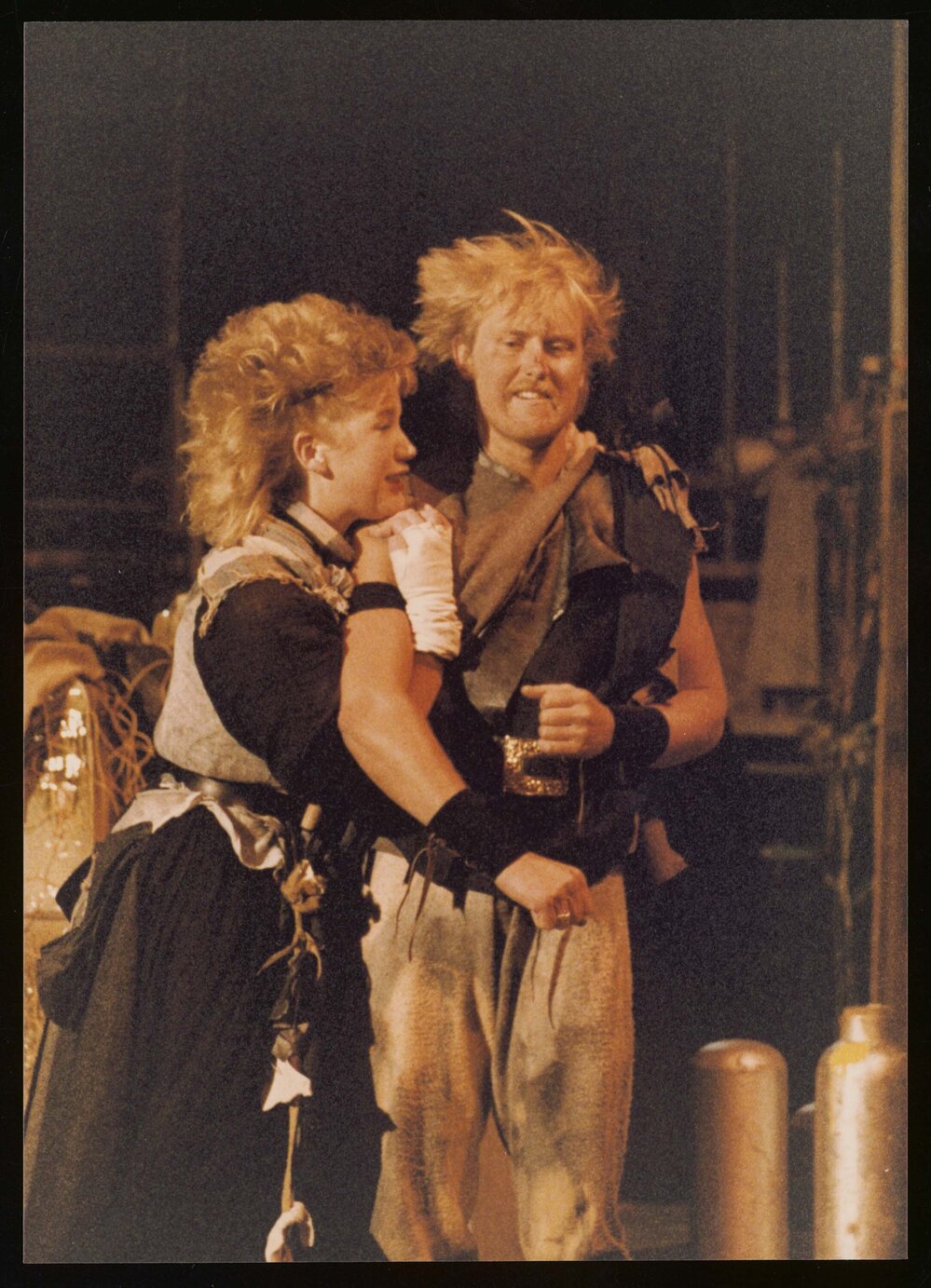 Two actors on stage during outdoor production of "Macbeth" in February 1983 (a)