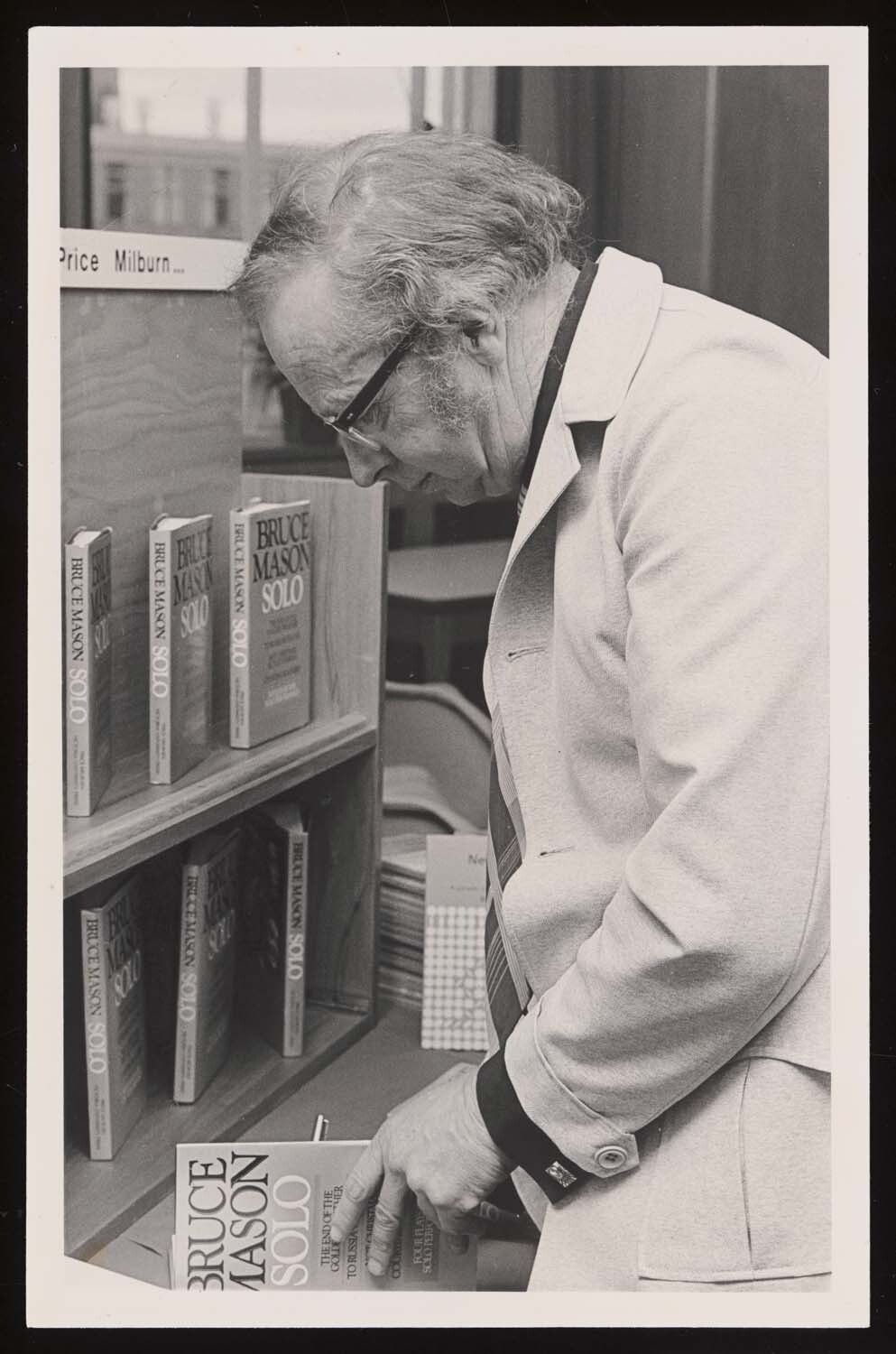 Bruce Mason signing copies of his book 'Solo'