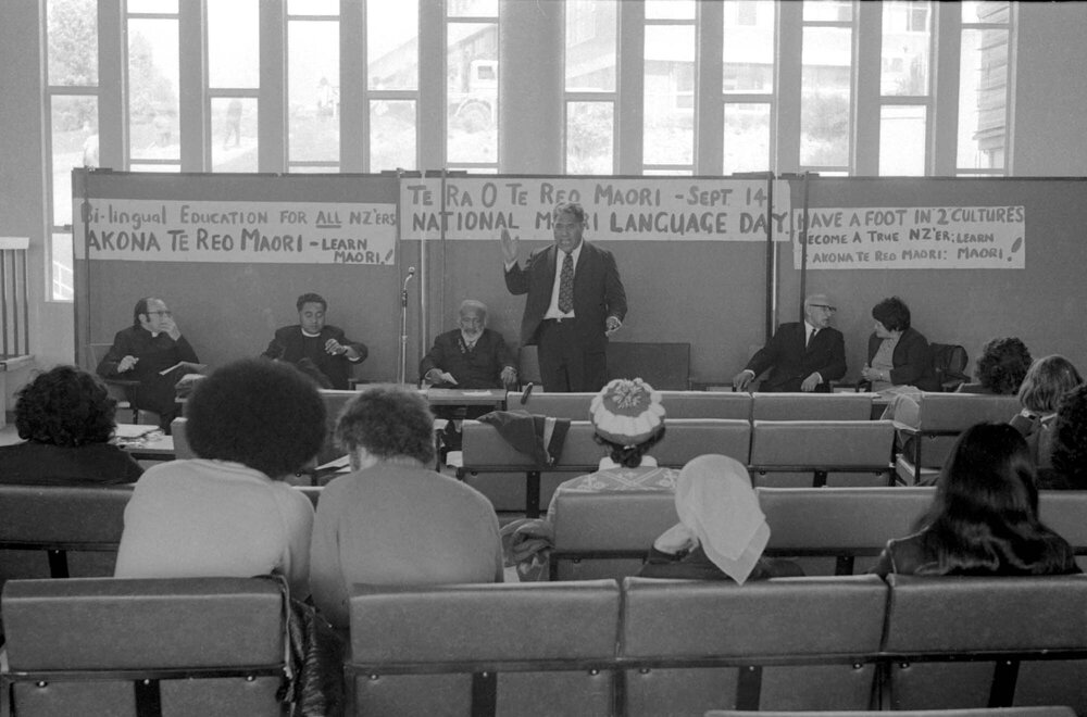 A speaker from the panel addresses the audience during Te Rā o te Reo Māori 1973