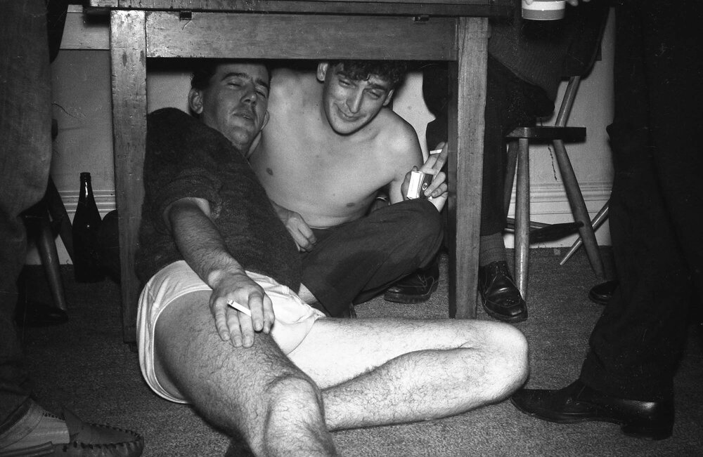 Under the table at a student party