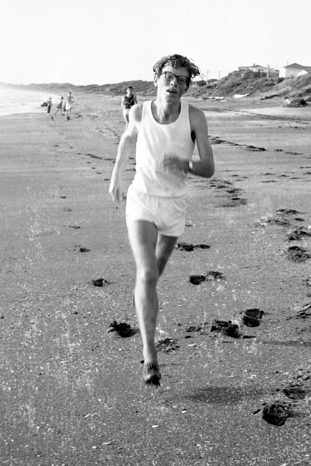 Victoria University cross country runner on beach