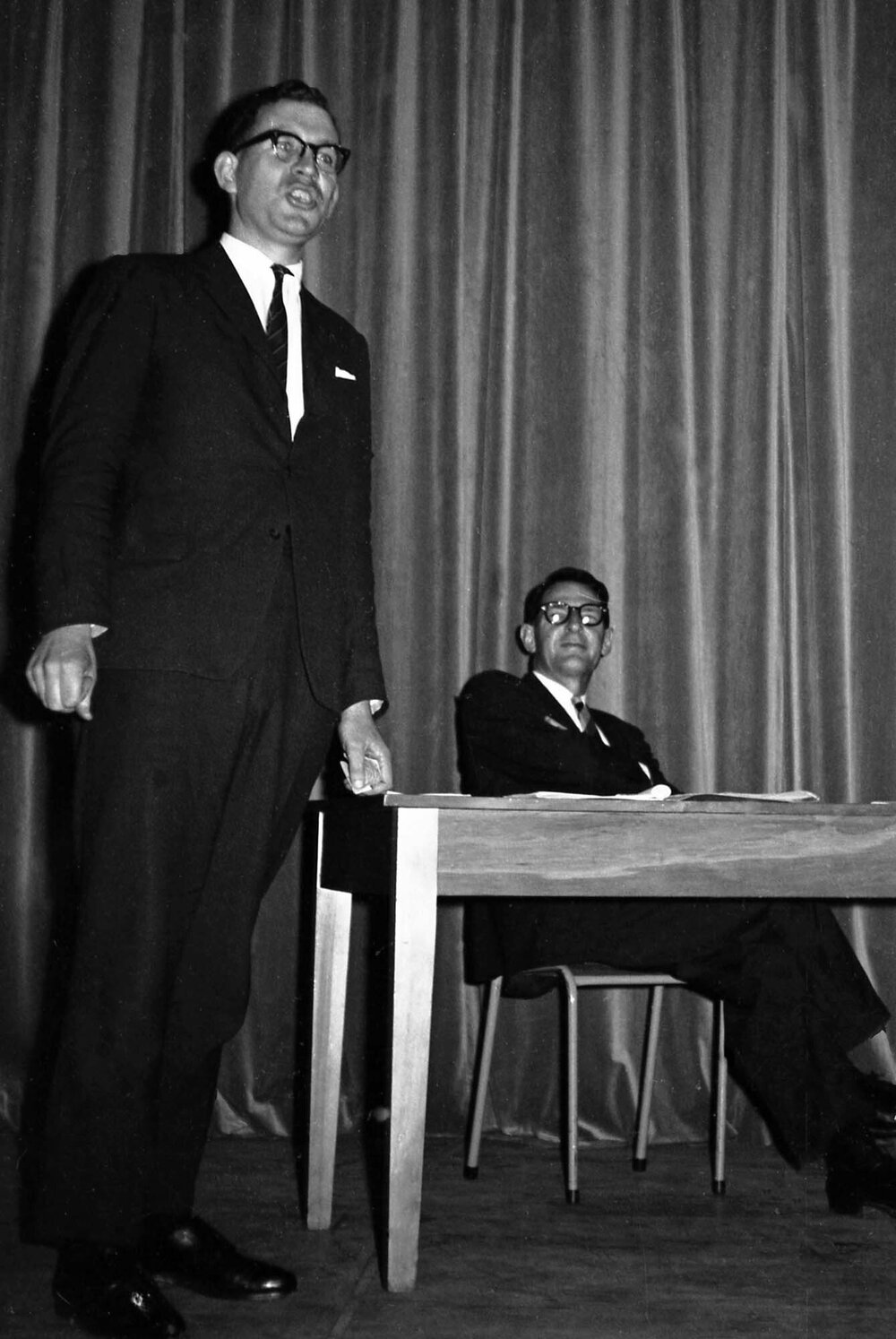 Unknown speaker and Dr Martin Findlay (seated)