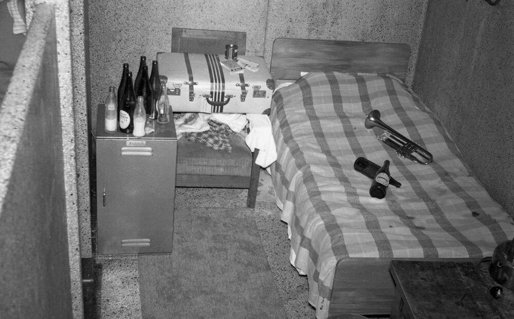 Bed and other possessions belonging to a Weir House resident inside the showers