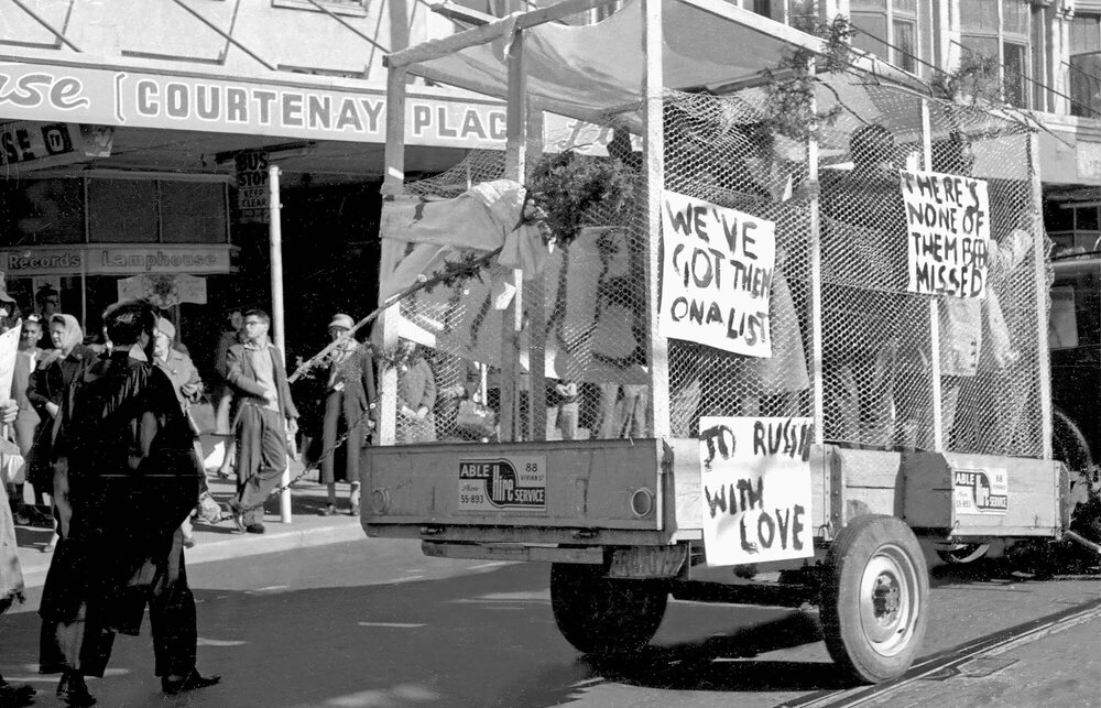 Students in caged trailer for annual procession through Wellington 