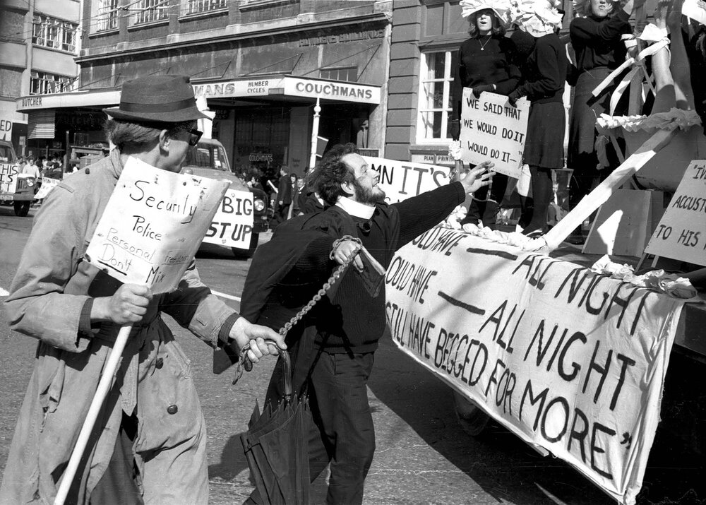 Students chase float at the annual student procession through Wellington
