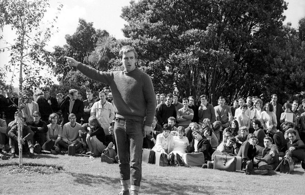 Students gathered outside listening to Roger Boshier speak at the weekly student forum