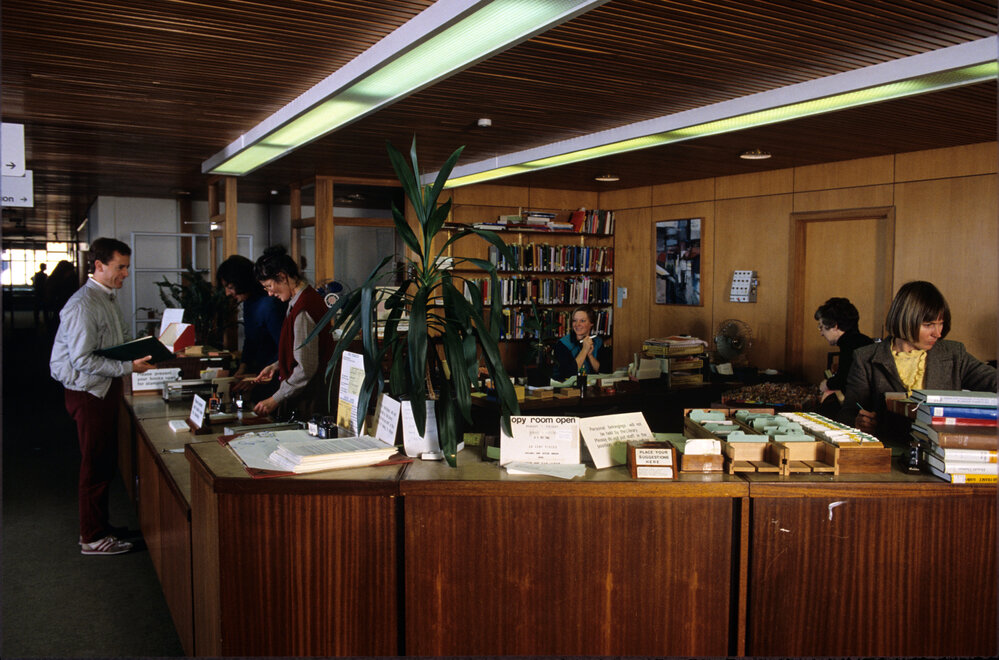 Slide 44 Library staff working at circulation and issue desk