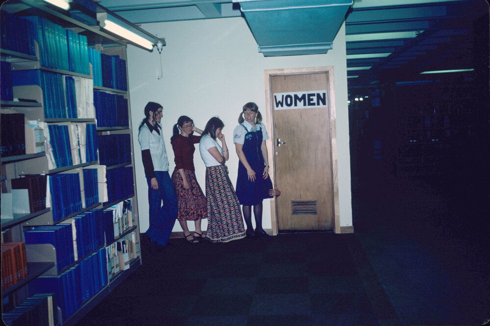 Slide 49 Women queuing outside women's bathroom, creepy hand