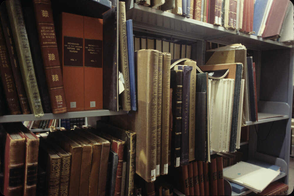 Slide 60 Large books on shelves