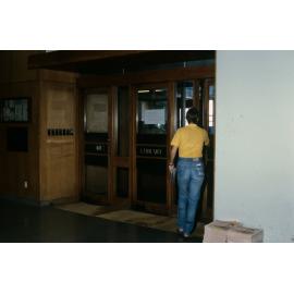 Slide 30 Student at library entrance