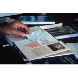 Slide 34 Library blue request card in new library book