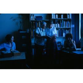Slide 50 Library staff, L-R Ruth Gilbert, Dorothy Freed (Head of Reference), Barbaro Harris (First Assistant), unknown