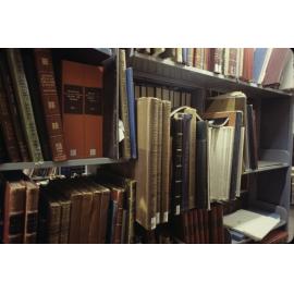 Slide 60 Large books on shelves