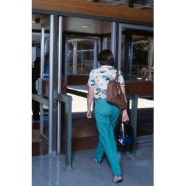 Slide 68 Student exiting library