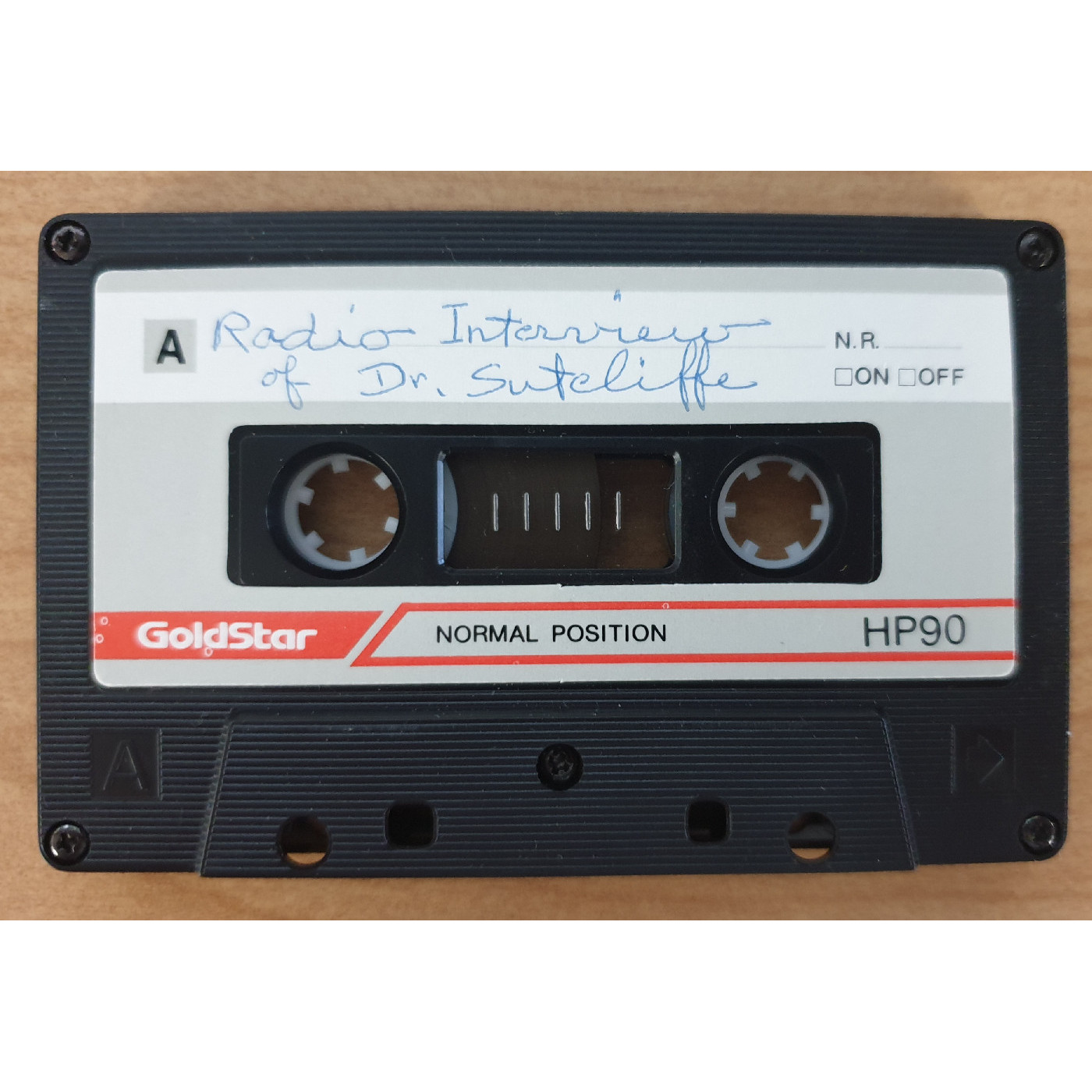 Tape deposited with publications - side A, 'Radio interview made shortly before Dr. Sutcliffe's death'