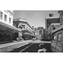 [Dixon Street, Wellington, looking towards The Terrace, showing Woolworths Building and Hope Brothers corner]