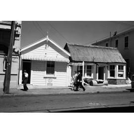 [Garrett Street, off Cuba Street, Wellington showing Reta's Quick Lunch shop]