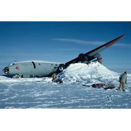 Crashed Super Connie Pegasus – NZ personnel survey the damage and potential booty