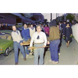 Ruka Broughton leads the dawn dedication ceremony of the poupou Taraika down Kelburn Parade
