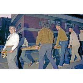 Ruka Broughton leads the dawn dedication ceremony of the poupou Taraika down Kelburn Parade