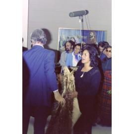 Hema Temara holds a kahu huruhuru during the unveiling of the carved poupou Taraika