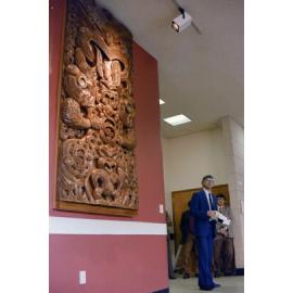 Ian Axford speaking during the unveiling of the carved poupou Taraika