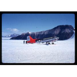 [Unnamed slide] depicts stationary United States Navy Otter plane