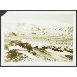 [Image of snowy hills.]