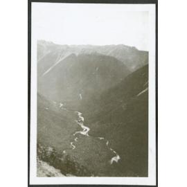 [Image of a river and valley.]