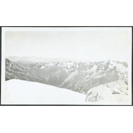 [Image of a snowy mountain ridge.]