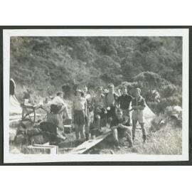 [Group image of tramping party at the campsite.]