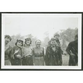 [Group image of  people standing outside in the snow.]