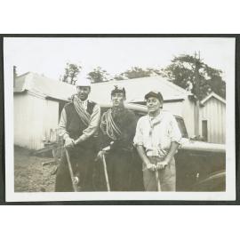 [Image of three men with climbing ropes and climbing axes]