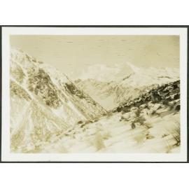 [Image of a snowy mountain range.]