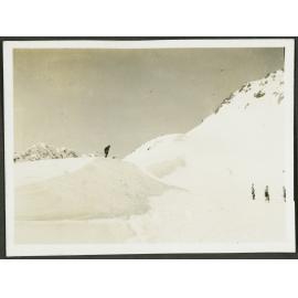 Temple Basin. [Image of a man skiing on top of a snowy mountain.]