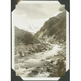Broderick Pass from Huxley Camp. [Image of a river.]