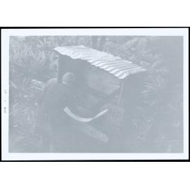 V.U.W. Tramping club working party 5-7 May 1967. T. Clarkson opens "Aloway-Dickson"'s new 'bog-hole.'