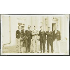 Residents stand in front of the Weir House entrance