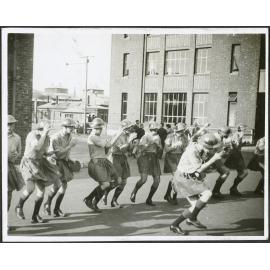 Weir residents doing a haka in Brodie helmets (2/2)