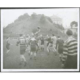 Weir rugby match, the teams jump for the ball