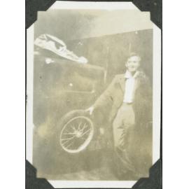 Young man with a car