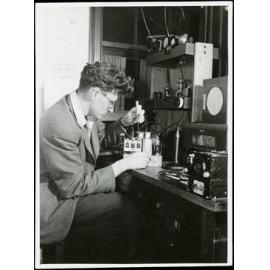 Weir resident working on electrical equipment