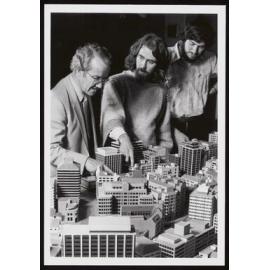 Dr George Baird, Mike Donn, and Frank Pool discussing energy use in buildings