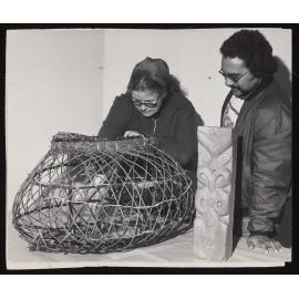 Lecturer Agnes Sullivan and Jim Schuster with a tāruke and a pou