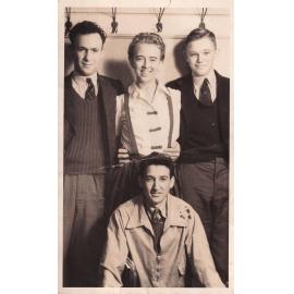 Mike Murray, Marie Marshall, unknown, and Barry Sargent in coat room