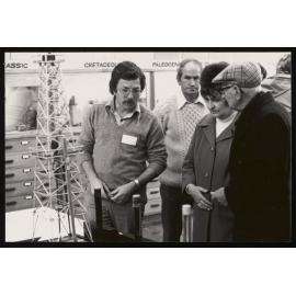 People looking at display inthe Geology Department's McKay Museum