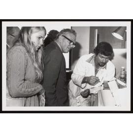 Keith Calder and people looking at a wafering saw on Open Day on 25th of May 1979